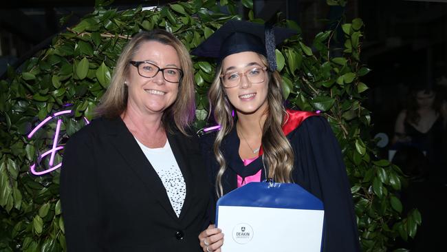 Lisa Mills and Ella Marshall celebrate graduation. Picture: Alan Barber