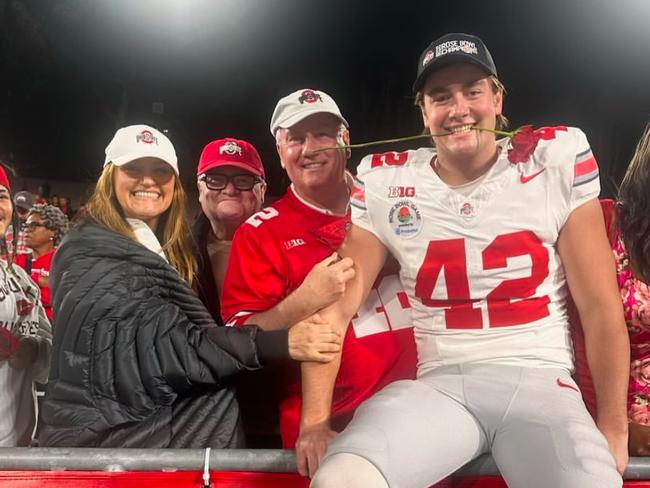 Joe McGuire with his parents Carla and Eddie at the Rose Bowl.