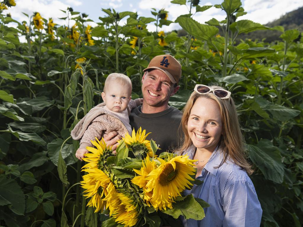 Rowland and Jenna Gittoes with baby Harriet at the picnic with the sunflowers event hosted by Ten Chain Farm, Saturday, June 8, 2024. Picture: Kevin Farmer