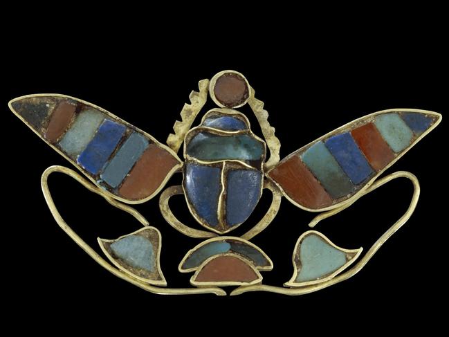 Ancient Egyptian jewellery, including this ornament of a winged scarab holding a sun-disc, will also form part of the NGV showcase. Picture: The Trustees of the British Museum