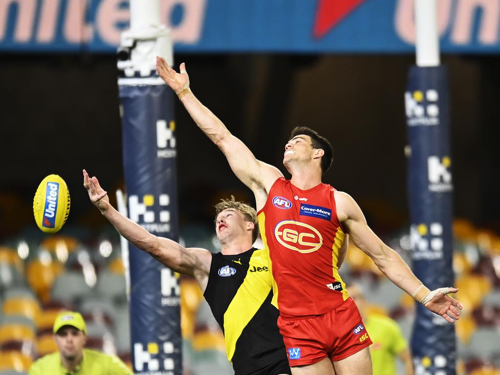 Sam Collins competes with Tom Lynch. (Photo by Albert Perez/Getty Images)