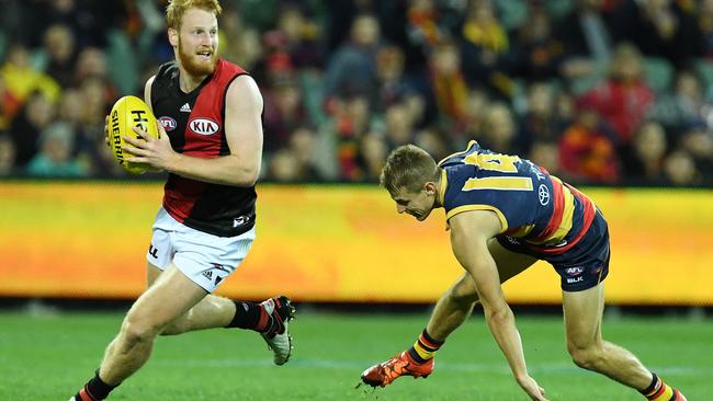 Bomber Aaron Francis gathers the ball from Crow David Mackay. Picture: Tom Huntley