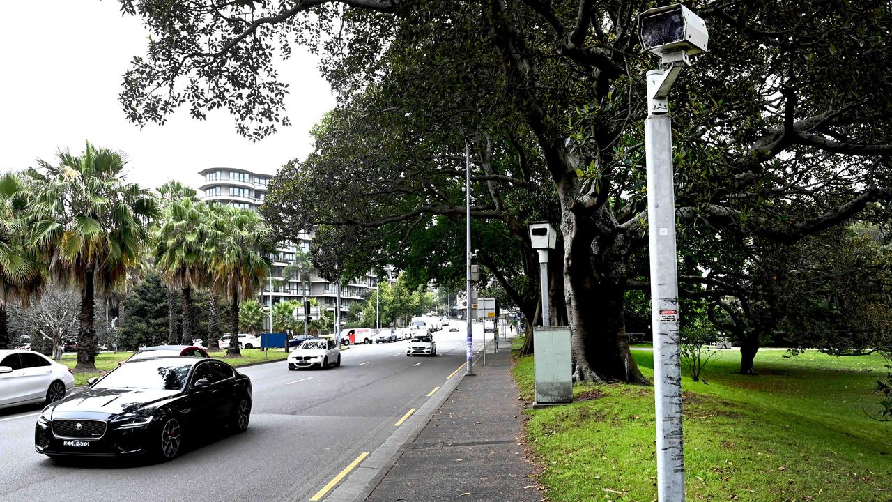 Motorists drive past a fixed speed camera. Picture: NCA NewsWire / Jeremy Piper