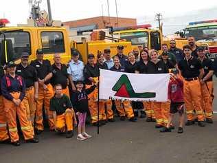 VOLUNTEER: RURAL Fire Service volunteers from around Bundaberg grouped together for the Pageant of Lights. Picture: Contributed