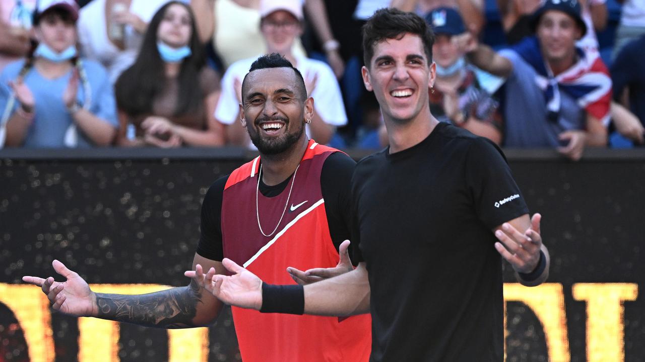 MELBOURNE, AUSTRALIA - JANUARY 25: Thanasi Kokkinakis of Australia and Nick Kyrgios of Australia celebrate match point in their Men's Doubles Quarterfinals match against Tim Puetz of Germany and Michael Venus of New Zealand during day nine of the 2022 Australian Open at Melbourne Park on January 25, 2022 in Melbourne, Australia. (Photo by Quinn Rooney/Getty Images)