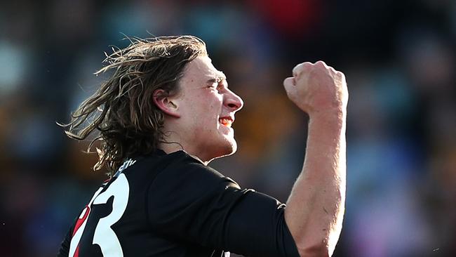 LAUNCESTON, AUSTRALIA - JUNE 20: Harrison Jones of the Bombers celebrates a goal during the round 14 AFL match between the Hawthorn Hawks and the Essendon Bombers at University of Tasmania Stadium on June 20, 2021 in Launceston, Australia. (Photo by Matt King/AFL Photos/via Getty Images)