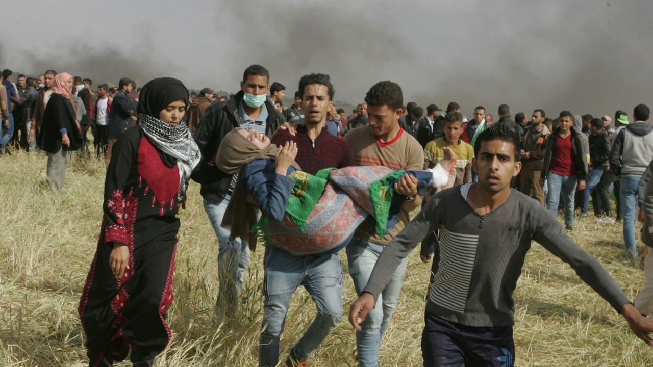 Palestinian Protesters Dead And Injured In Clash At Gaza-Israel Border