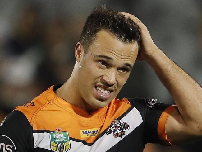 Luke Brooks of the Tigers reacts after losing the Round 16 NRL match between the Wests Tigers and the Gold Coast Titans at Campbelltown Stadium in Sydney, Friday, June 23, 2017. (AAP Image/Daniel Munoz) NO ARCHIVING, EDITORIAL USE ONLY