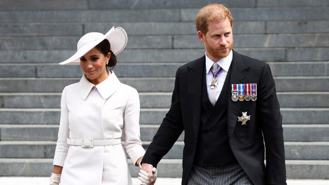 Prince Harry and Meghan Markle were booed after leaving Friday’s Service of Thanksgiving. Picture: Henry Nicholls/WPA Pool/Getty Images.