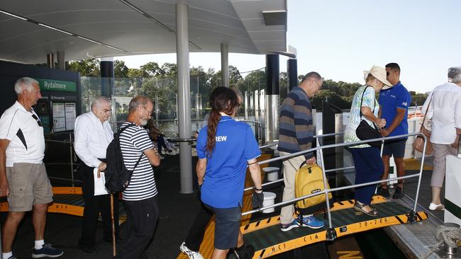 Passengers embark the Rivercat from at Rydalmere. Picture: John Appleyard