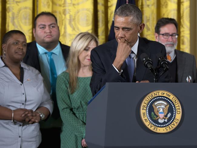 Emotional moment ... President Barack Obama delivers his powerful address surrounded by gun violence victims. Picture: AP Photo/Carolyn Kaster