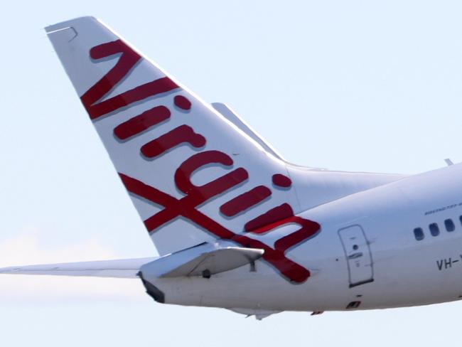 SYDNEY, AUSTRALIA - NewsWire Photos JUNE 10, 2022: Virgin Plane takes off at Sydney airport. Picture: NCA NewsWire / Damian Shaw