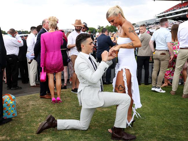 Mitch Kane, 21, proposes to Celeste Osborne, 25 — she said yes. Picture: Mark Stewart