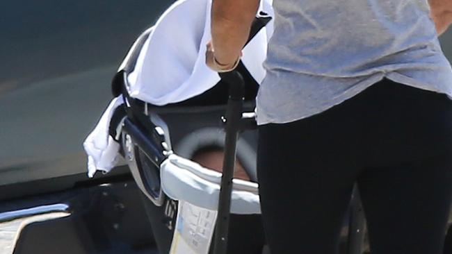 Hollywood couple Sam Worthington and Lara Bingle's newborn baby boy Rocket Zot goes on a stroll with grandma Bingle in Malibu, CA.