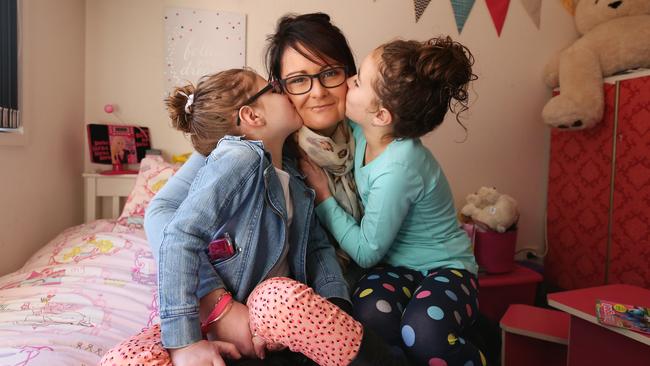 Suzannah Taylor with daughters Macy Menzie, 5, and Matilda Menzie, 7. Suzannah has been nominated in the Community Spirit category of the Pride of Australia Awards. Picture: NIKKI DAVIS-JONES