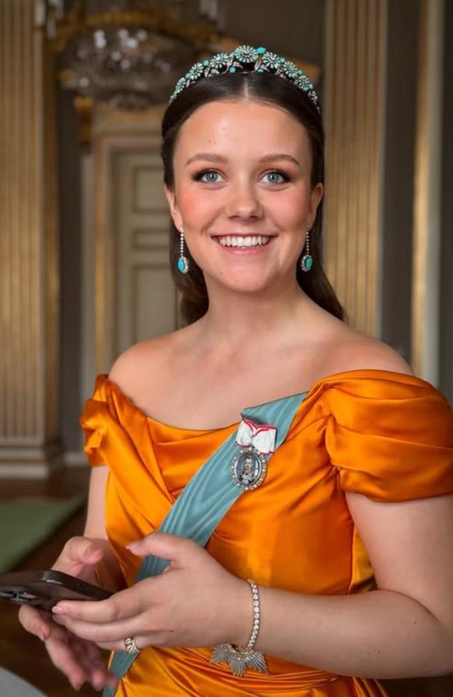 Princess Isabella of Denmark holds her iPhone in on of the official gala portraits to mark her 18th birthday. Picture: Steen Evald, Kongehuset
