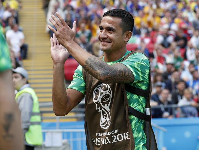 Tim Cahill warms up on the sideline before the France game. Will he play against Denmark? Picture: Toby Zerna
