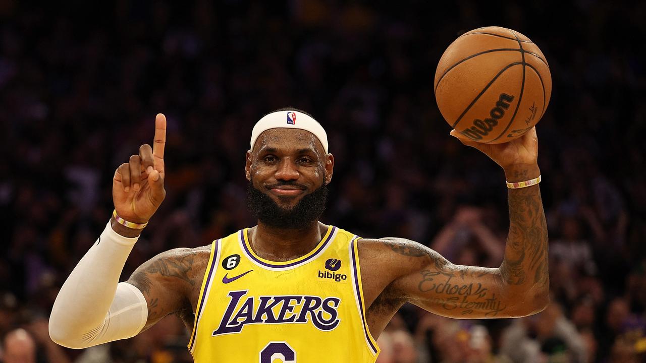 TOPSHOT - LOS ANGELES, CALIFORNIA - FEBRUARY 07: LeBron James #6 of the Los Angeles Lakers reacts after scoring to pass Kareem Abdul-Jabbar to become the NBA's all-time leading scorer, surpassing Abdul-Jabbar's career total of 38,387 points against the Oklahoma City Thunder at Crypto.com Arena on February 07, 2023 in Los Angeles, California. NOTE TO USER: User expressly acknowledges and agrees that, by downloading and or using this photograph, User is consenting to the terms and conditions of the Getty Images License Agreement. Harry How/Getty Images/AFP (Photo by Harry How / GETTY IMAGES NORTH AMERICA / Getty Images via AFP)