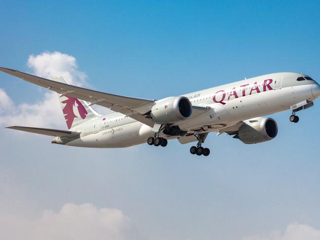 ESCAPEQatar Airways planePhoto - Qatar