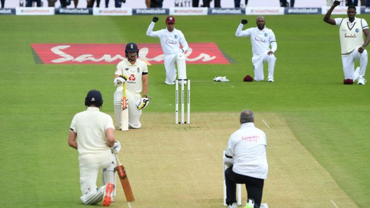 England cricketers kneel in support of the West Indies.