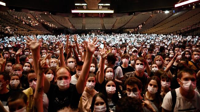 No social distancing was required but masks were compulsory at Saturday night’s gig by Indochine at Paris’s Bercy concert hall. Picture: AFP