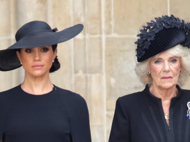 Meghan, Duchess of Sussex and Camilla, Queen Consort are seen during The State Funeral Of Queen Elizabeth II at Westminster Abbey on September 19, 2022 in London, England. Elizabeth Alexandra Mary Windsor was born in Bruton Street, Mayfair, London on 21 April 1926. She married Prince Philip in 1947 and ascended the throne of the United Kingdom and Commonwealth on 6 February 1952 after the death of her Father, King George VI. Queen Elizabeth II died at Balmoral Castle in Scotland on September 8, 2022, and is succeeded by her eldest son, King Charles III. (Photo by Chris Jackson/Getty Images) *** BESTPIX ***