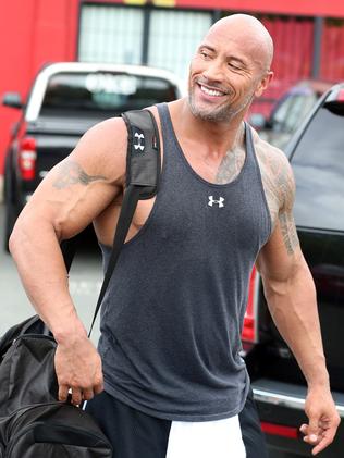 Going home ... Johnson leaving the gym to head to set. Picture: Richard Gosling