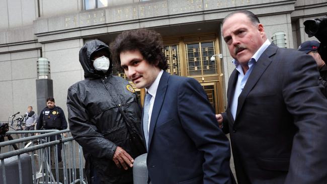 Founder Sam Bankman-Fried exits a Manhattan Federal Court for a court appearance in New York City. Bankman-Fried is charged with eight criminal counts of fraud, conspiracy, and money-laundering offences which include making illegal political contributions. Picture: Spencer Platt/Getty Images/AFP