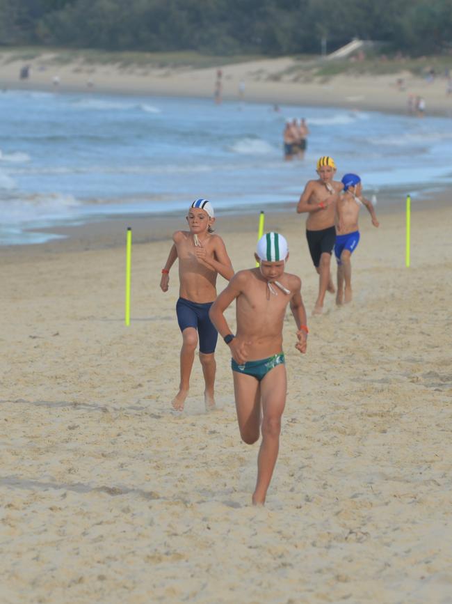 Running action at the Queensland Youth Surf Life Saving Championships on February 17.