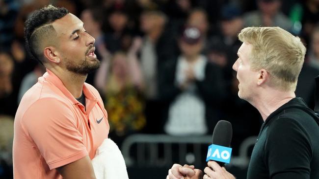 Dual-Australian Open champion Jim Courier talks with Nick Kyrgios