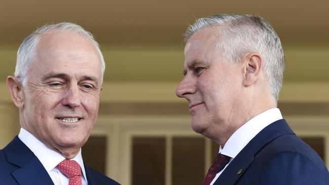 Malcolm Turnbull (left) congratulates Michael McCormack. Photo: AAP