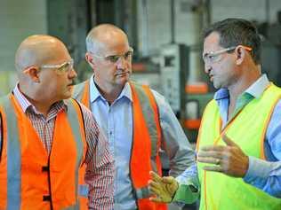 State Treasurer Curtis Pitt, Glenn Butcher mp and  CEO Derek Berg  at Berg Engineering. Picture: Mike Richards GLA190417STATE