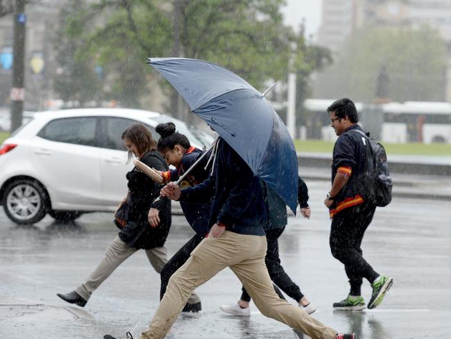 Wet weather in Victoria Square, Adelaide. Picture: Greg Higgs