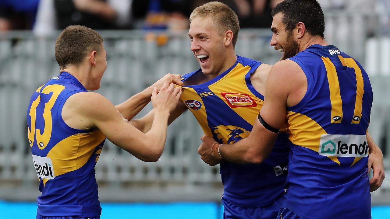 The Eagles’ Oscar Allen celebrates with teammates after kicking a goal against Collingwood. Picture: Will Russell/AFL Photos/via Getty Images