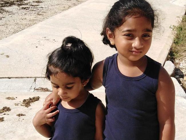 Kopika (right) and Tharunicaa, the daughters of the Biloela Tamil family at the detention centre on Christmas Island.