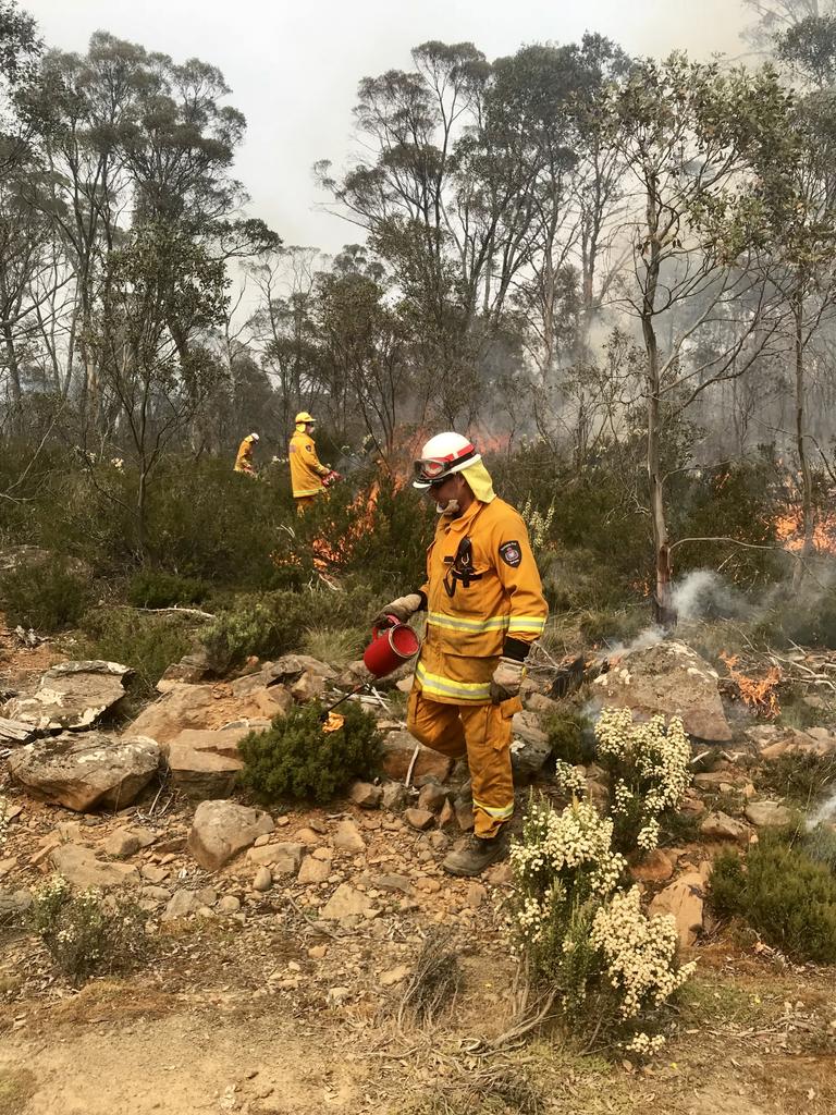 Firefighters at work battling blazes in Tasmania's Central Highlands. Picture: Tara Felts