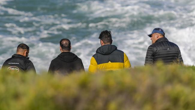 Family at the scene. Picture: Roy VanDerVegt