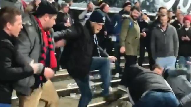 The man in the beanie, Stuart, contacted the Addy to say he put his foot in the fight in an attempt to rescue a fellow Cats fan. Picture: Supplied