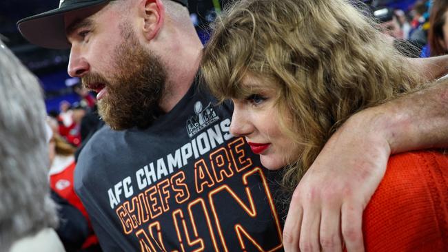 Travis Kelce of the Kansas City Chiefs celebrates with Taylor Swift after defeating the Baltimore Ravens. Picture: Patrick Smith/Getty.