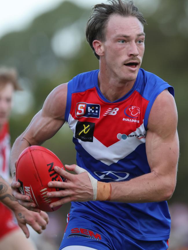 Central District's Mani Liddy in action against the Roosters. Picture: David Mariuz/SANFL