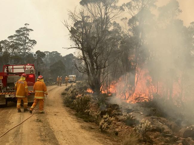 Firefighters at work in the Central Highlands. Picture: TARA FELTS