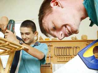 Faith Lutheran College students Michael Jones (left), 14, and Anthony Lunn, 14, hard at work. Photo: David Nielsen