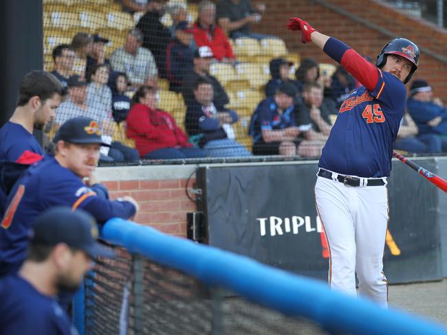 Austin Gallagher has a practice swing before heading into bat for Adelaide Bite. Picture: Dean Martin/AAP