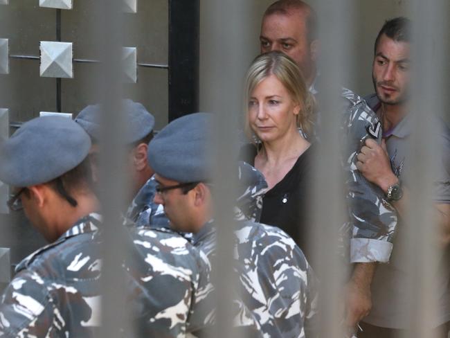 Sally Faulkner led away from court to a prison van at the back of the Palace of Justice, Baabda, Lebanon. Picture: Liam Kidston.