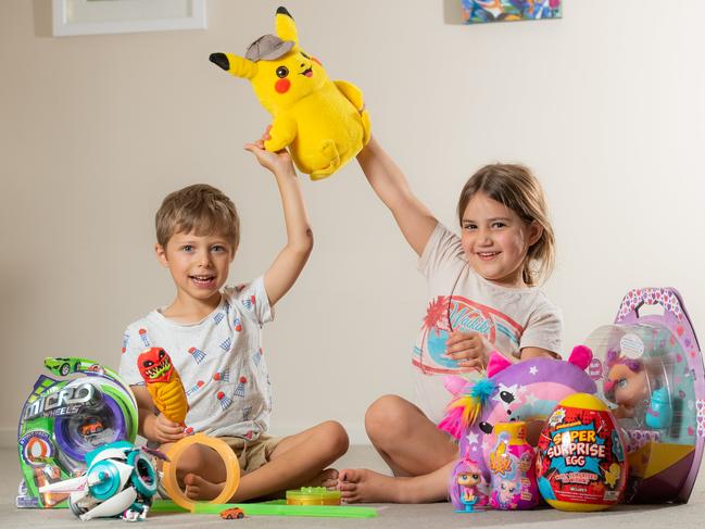 Arnold Grynberg, 5, and Adele Rochman, 4, with the best new toys of the year. Picture: Jason Edwards