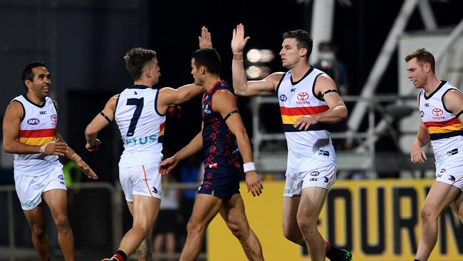 Josh Jenkins celebrates a goal with Crows teammates. Picture: AAP Image/Dan Peled