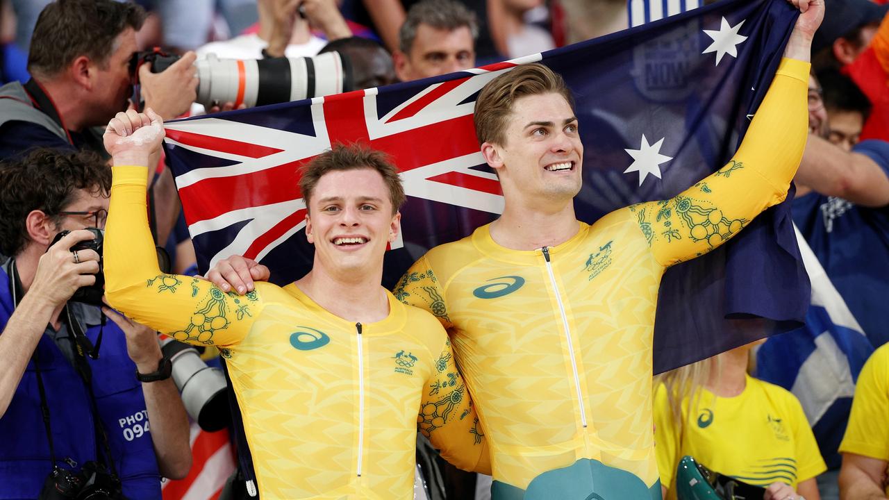 PARIS, FRANCE - AUGUST 11: (L-R) Silver medalist Matthew Richardson and Bronze medalist Matthew Glaetzer of Team Australia celebrate after the Men's Keirin, Final for Gold on day sixteen of the Olympic Games Paris 2024 at Saint-Quentin-en-Yvelines Velodrome on August 11, 2024 in Paris, France. (Photo by Jared C. Tilton/Getty Images)