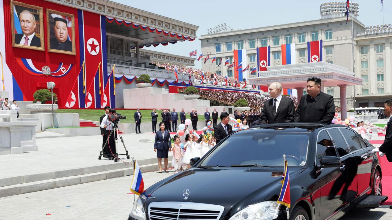 IKim Jong Un and Vladimir Putin attend a welcoming ceremony at Kim Il Sung Square in Pyongyang on June 19, 2024. (Photo by Gavriil GRIGOROV / POOL / AFP)