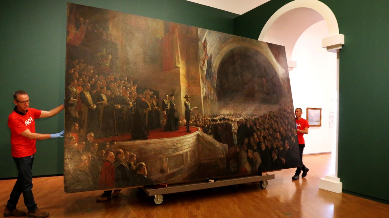 Tom Roberts’ painting, The Big Picture, is wheeled into the National Gallery of Australia after being loaned out by Parliament House for a special exhibition in 2015. Picture: Ray Strange.