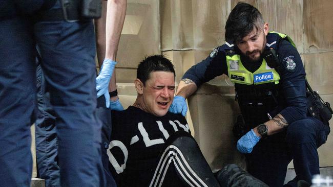 The man was chased and pepper sprayed by police outside the Supreme Court of Victoria on William St. Picture: David Geraghty / NewsWire.